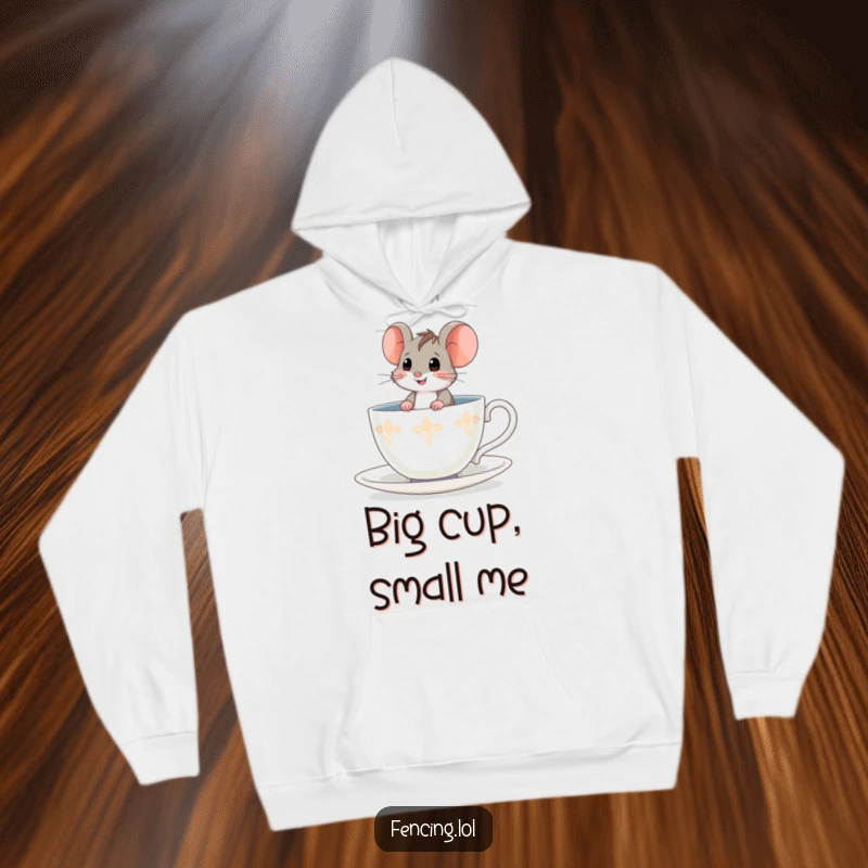Funny brave mouse hoodie, comfortably seated in a giant teacup, offering warmth and tiny-heroic humor.