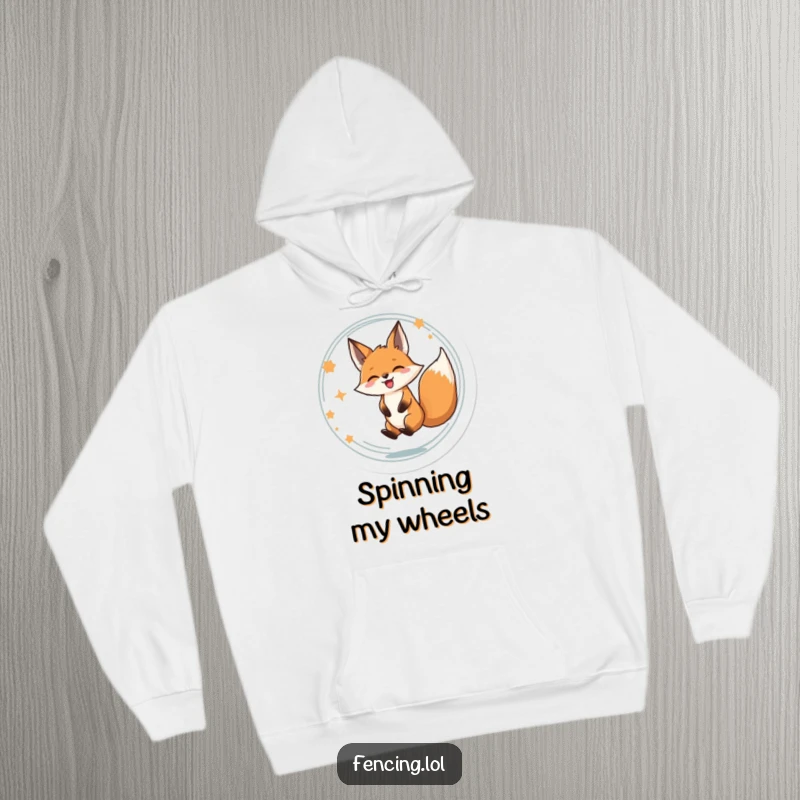 Funny hoodie design featuring a determined fox spinning with absolute delight, a symbol of carefree happiness.